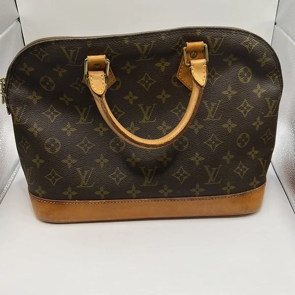 Louis Vuitton Alma PM Handbag - Picture 9 of 11